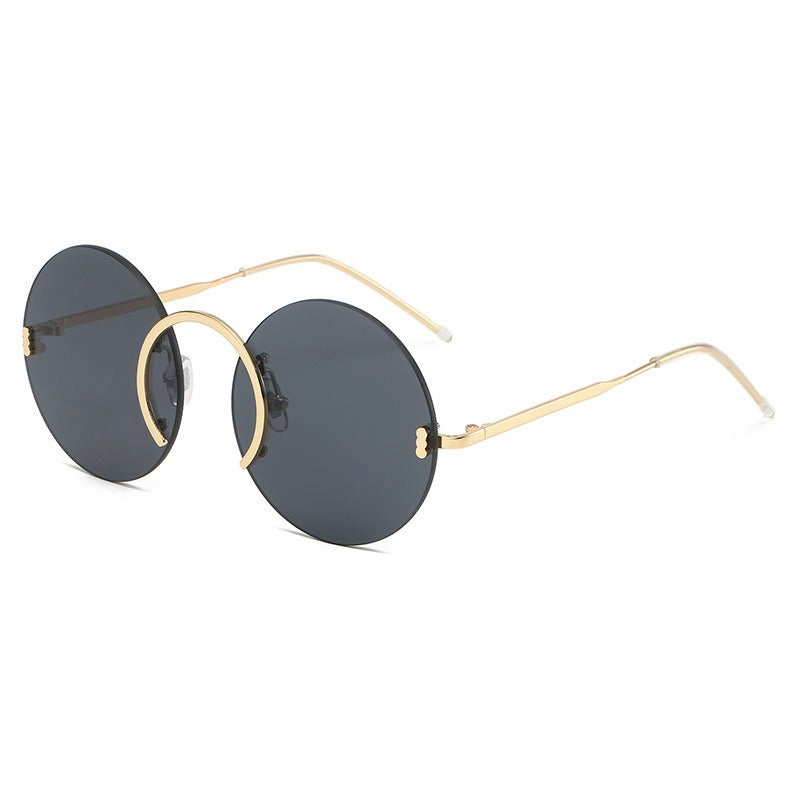 Punk style sunglasses glasses European and American round frame rimless sunglasses