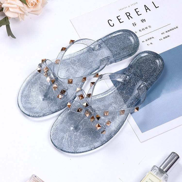 New style rivet shoes, bow shaped flip flops, summer beach outings, flat bottomed transparent jelly crystal slippers for women