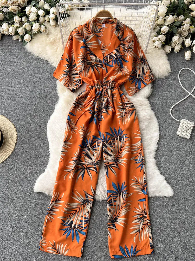 Women European and American V-neck short-sleeved lace-up waist slim straight-leg loose printed long wide-leg jumpsuit D0669